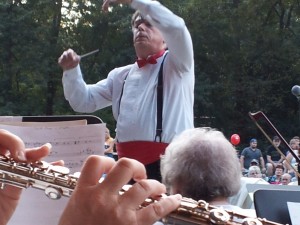 Conductor Eric Benjamin directing